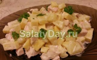 Delicious salads with chicken and pineapple