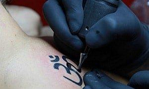 Tetovaže v budizmu: mantre, njihova simbolika in sveti pomen